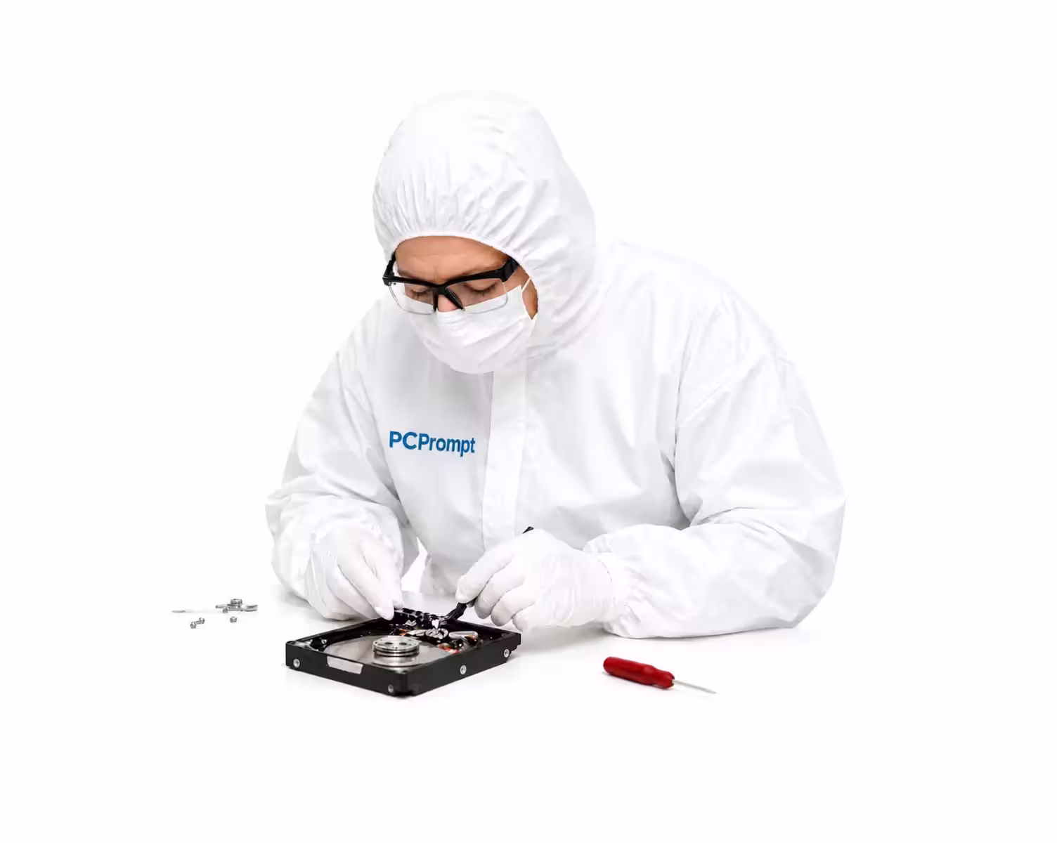 Professional data recovery technician repairing hard drive in Kochi
